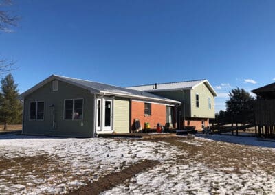 New siding back of the house view