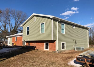 New siding back of the house view