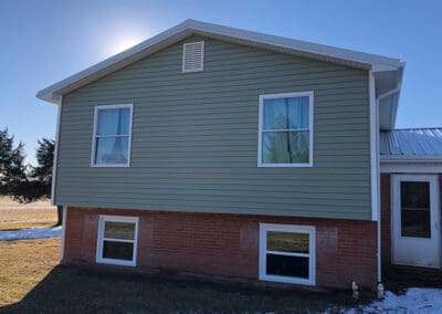New siding back of the house view