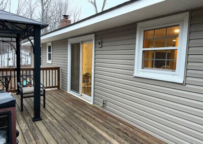 New siding back of the house view